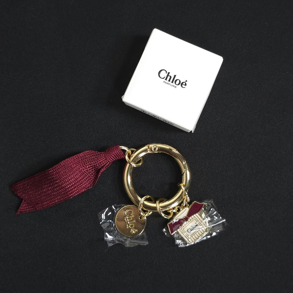 CHLOE Women's New Keyring Bag Charm Gold Burgundy Ribbon Flower Perfume Bottle